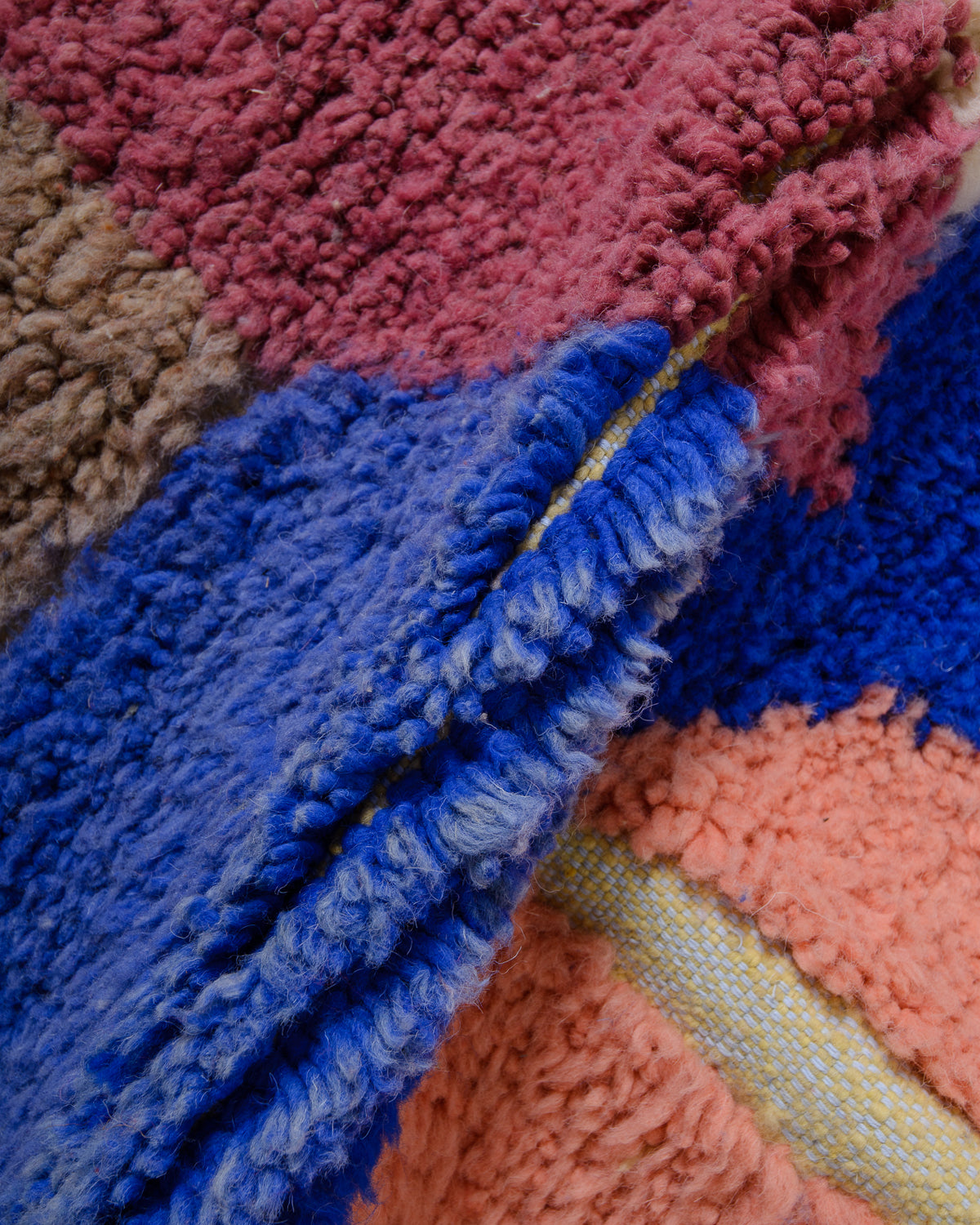 Modern, designer, handcrafted Berber rug from Morocco. Beniourain carpet with beautiful colours and patterns and fluffy wool texture.